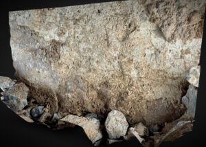 3D model of a plastered wall fragment above a pile of fallen stones, from the Apostolos Andreas Chapel, Cyprus