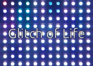 Still from the video Glitch of Life: a grid of glowing LED dots with the title Glitch of Life